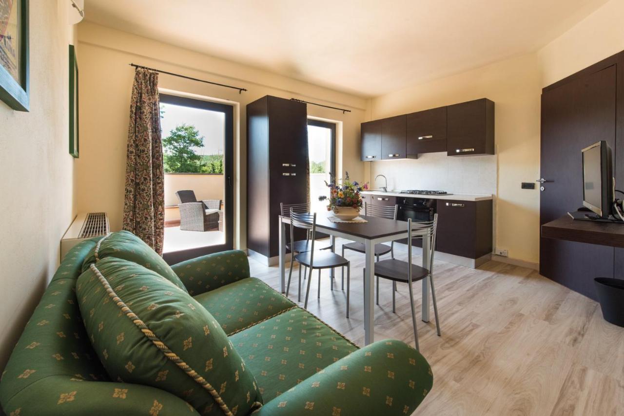 Residenze Pianetti Apartment มันชาโน ภายนอก รูปภาพ