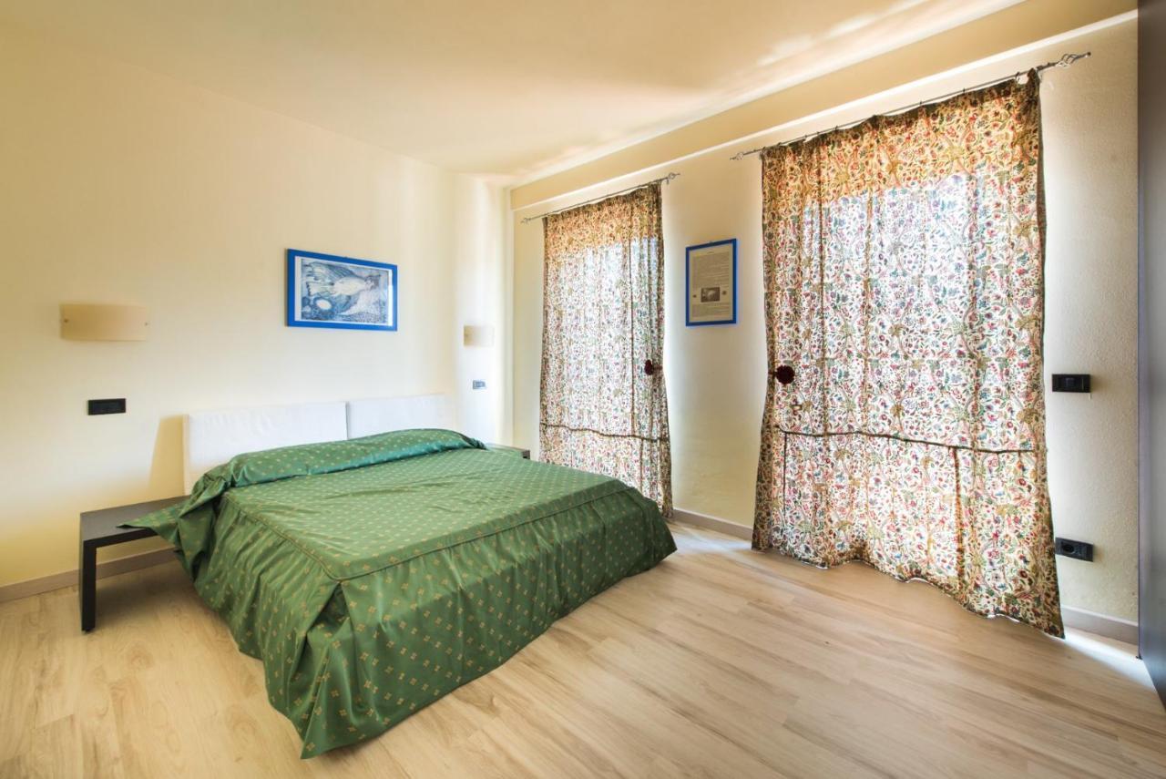 Residenze Pianetti Apartment มันชาโน ภายนอก รูปภาพ